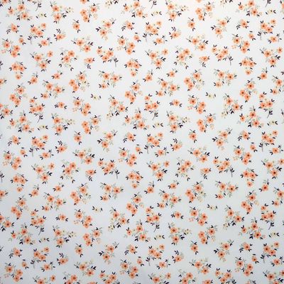 tricoline-flor-laranja-fundo-creme-40-della-aviamentos